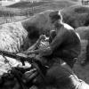 LCpl. Tagata (KIA 12/3/1965) and Doc Harris feeding the belt.